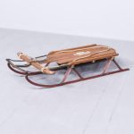 A Metal, Wood and Painted Sleigh
