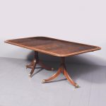 Regency-Style Inlaid Mahogany Twin-Pillar Dining Table with Two Detachable Leaves