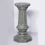 A Serpentine Pedestal with Revolving Top