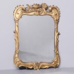 A Mid-19th Century Carved Wood and Gilded Wall Mirror