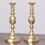 A Pair of Brass ‘King of Diamonds’ Candlesticks