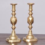 A Pair of Brass ‘King of Diamonds’ Candlesticks