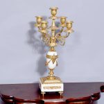 A Gilded and White Marble Candelabrum