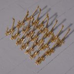 Large set of 21 Cast Brass Double Wall Hooks
