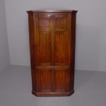 A George III Mahogany Floor Standing Double Corner Cabinet
