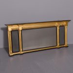 Neat-sized Regency gilt overmantel beveled-edge mirror