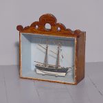 A Glazed and Framed Ship Model