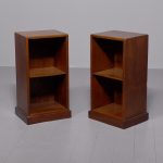 A quality pair of teak open bedside cabinets